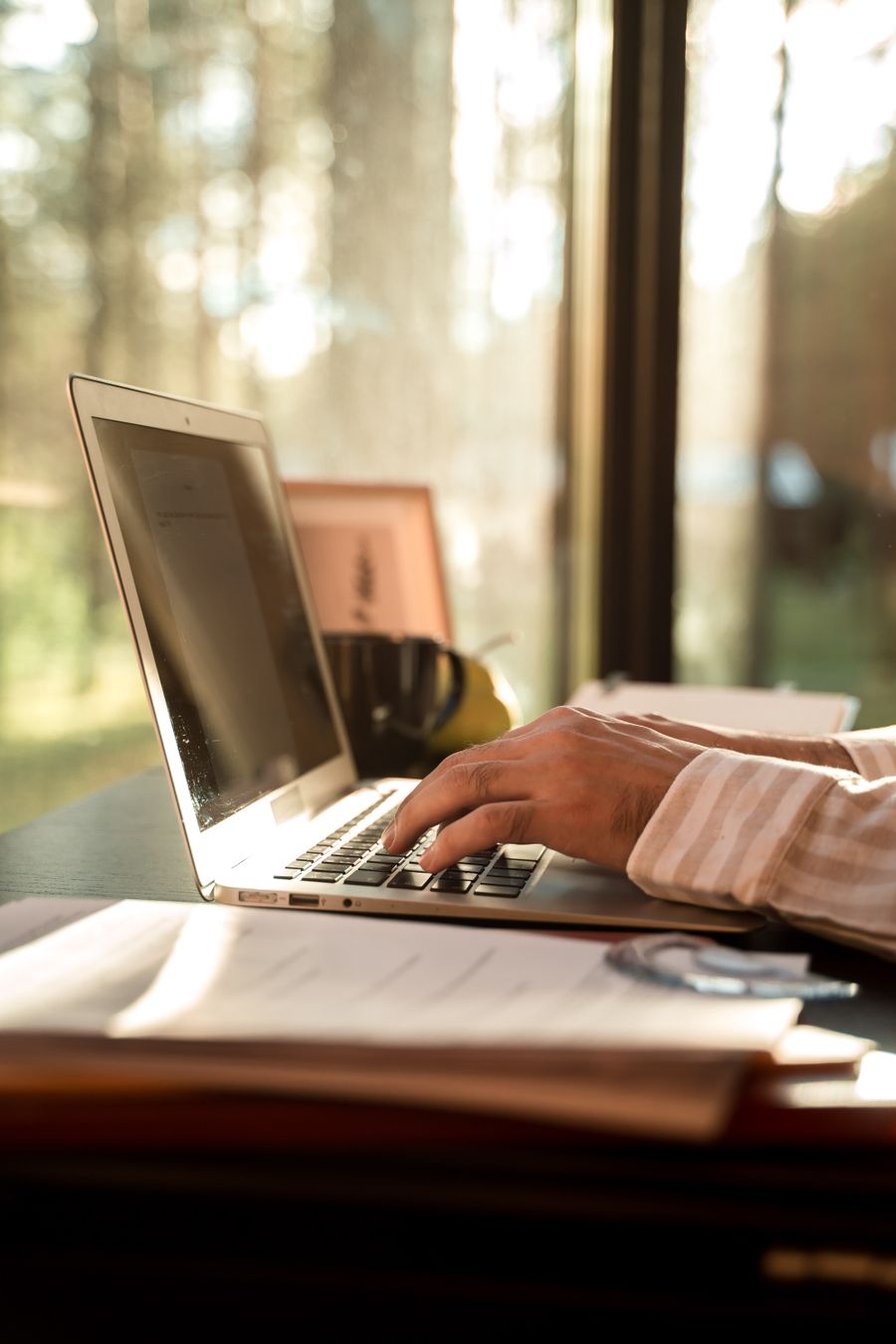 Professional preparing for an interview with a laptop